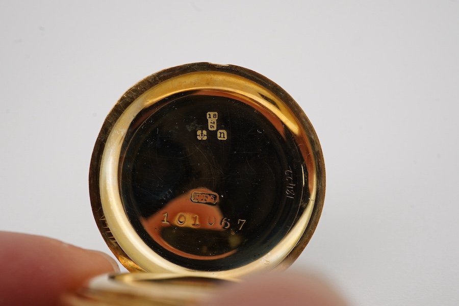 An early 20th century 18ct gold and two colour enamel open faced fob watch(enamel a.f.), with Arabic dial, case diameter 27mm, suspended from a Murrle Bennett & Co 9ct brooch. Condition - poor to fair